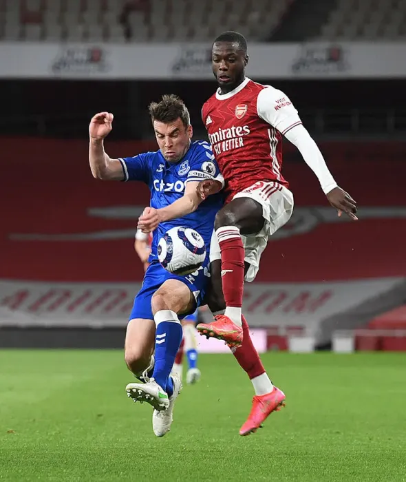 Framed Print : Pepe vs Coleman: A Premier League Showdown at Empty Emirates - Arsenal vs Everton (2020-21)