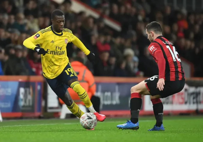 Framed Print : Pepe vs Cook: AFC Bournemouth vs Arsenal FC - FA Cup Fourth Round Clash Framed Print : Pepe vs Cook: AFC Bournemouth vs Arsenal FC - FA Cup Fourth Round Clash