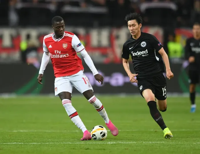 Framed Print : Pepe vs Kamada: Clash of Wings in Europa League's Group F - Arsenal vs Eintracht Frankfurt Framed Print : Pepe vs Kamada: Clash of Wings in Europa League's Group F - Arsenal vs Eintracht Frankfurt