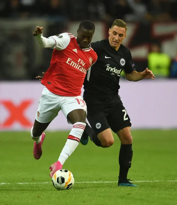Framed Print : Pepe vs. Kohr: A Europa League Battle - Arsenal's Nicolas Pepe Goes Head-to-Head with Eintracht Frankfurt's Dominik Kohr Framed Print : Pepe vs. Kohr: A Europa League Battle - Arsenal's Nicolas Pepe Goes Head-to-Head with Eintracht Frankfurt's Dominik Kohr