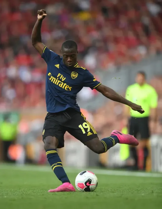 Framed Print : Pepe vs. Liverpool: Arsenal's Star Forward Faces Off in Premier League Showdown
