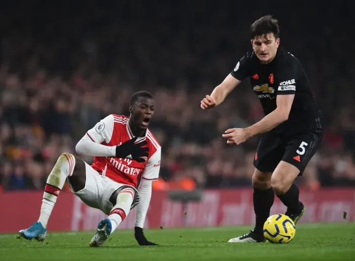 Framed Print : Pepe vs. Maguire: Foul Play in Arsenal vs. Manchester United - Premier League 2019-20 Framed Print : Pepe vs. Maguire: Foul Play in Arsenal vs. Manchester United - Premier League 2019-20