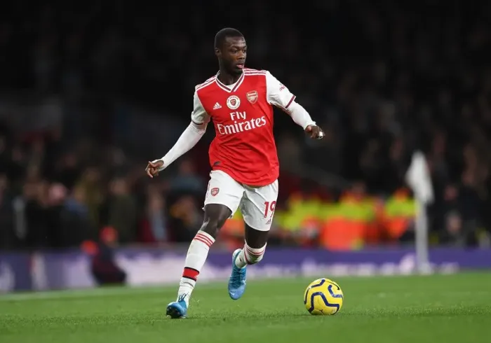 Framed Print : Pepe vs Manchester City: Arsenal's Star Forward Faces Off in Premier League Showdown