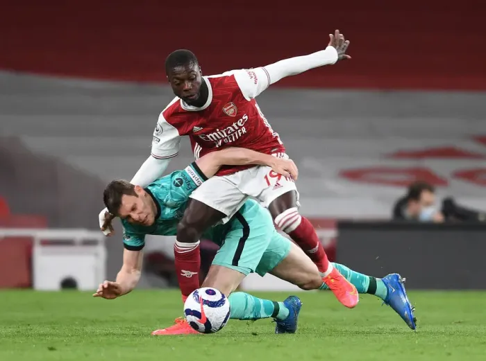 Framed Print : Pepe vs. Milner: Empty Emirates Rivalry - Arsenal vs. Liverpool (2020-21) Premier League Clash Framed Print : Pepe vs. Milner: Empty Emirates Rivalry - Arsenal vs. Liverpool (2020-21) Premier League Clash