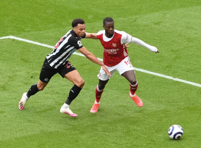 Framed Print : Pepe vs Murphy: A Battle Unfolds at Empty St. James Park - Arsenal vs Newcastle, Premier League 2021 Framed Print : Pepe vs Murphy: A Battle Unfolds at Empty St. James Park - Arsenal vs Newcastle, Premier League 2021