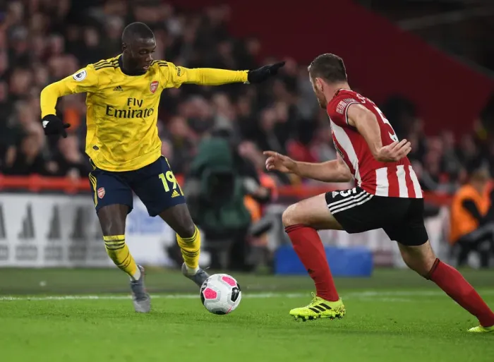 Framed Print : Pepe vs O'Connell: Battle at Bramall Lane - Sheffield United vs Arsenal, Premier League 2019-20 Framed Print : Pepe vs O'Connell: Battle at Bramall Lane - Sheffield United vs Arsenal, Premier League 2019-20