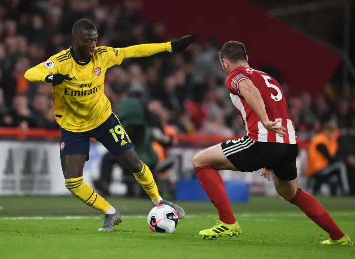 Framed Print : Pepe vs O'Connell: Clash at Bramall Lane - Sheffield United vs Arsenal, Premier League 2019-20 Framed Print : Pepe vs O'Connell: Clash at Bramall Lane - Sheffield United vs Arsenal, Premier League 2019-20