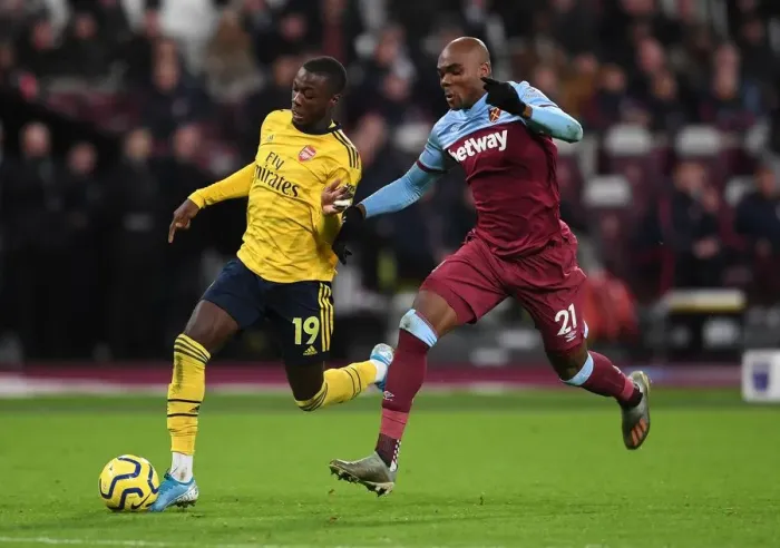 Framed Print : Pepe vs Ogbonna: Battle at London Stadium - West Ham United vs Arsenal FC, Premier League 2019-20 Framed Print : Pepe vs Ogbonna: Battle at London Stadium - West Ham United vs Arsenal FC, Premier League 2019-20