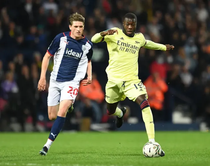 Framed Print : Pepe vs Reach: A Carabao Cup Showdown - Arsenal's Nicolas Pepe Clashes with West Bromwich Albion's Adam Reach