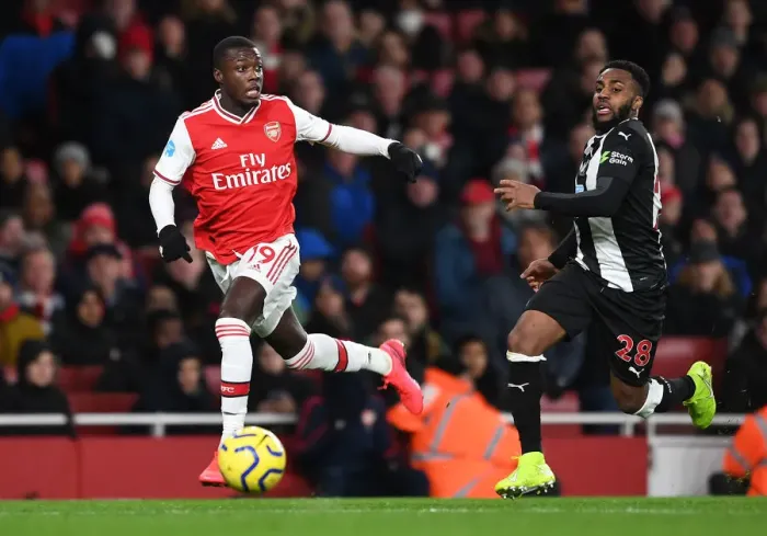 Framed Print : Pepe vs. Rose: Intense Clash in Arsenal's Premier League Battle against Newcastle Framed Print : Pepe vs. Rose: Intense Clash in Arsenal's Premier League Battle against Newcastle