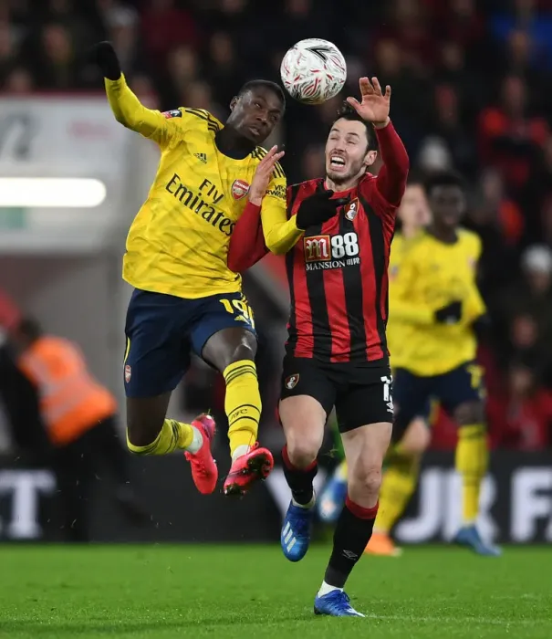Framed Print : Pepe vs Smith: Intense Clash in FA Cup Fourth Round between AFC Bournemouth and Arsenal Framed Print : Pepe vs Smith: Intense Clash in FA Cup Fourth Round between AFC Bournemouth and Arsenal