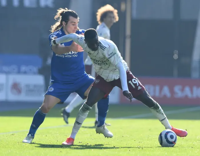 Framed Print : Pepe vs Soyuncu: Battle at The King Power Stadium - Leicester City vs Arsenal, Premier League 2020-21