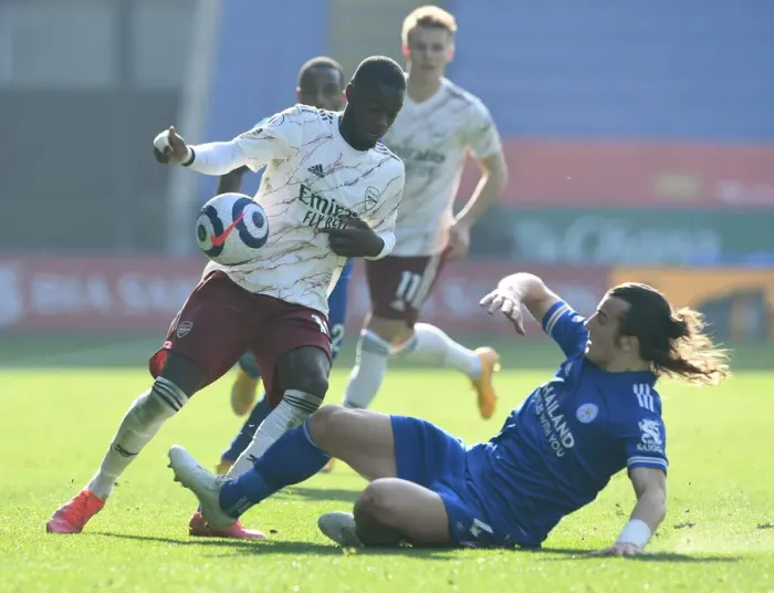 Framed Print : Pepe vs Soyuncu: Intense Battle in Leicester City vs Arsenal Premier League Clash