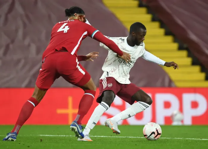 Framed Print : Pepe vs. Van Dijk: Battle at Anfield in Empty Premier League Stadium (Liverpool vs. Arsenal, 2020-21)