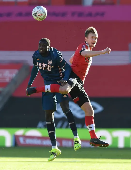 Framed Print : Pepe vs Ward-Prowse: FA Cup Clash Between Southampton and Arsenal Amidst Empty Stands Framed Print : Pepe vs Ward-Prowse: FA Cup Clash Between Southampton and Arsenal Amidst Empty Stands