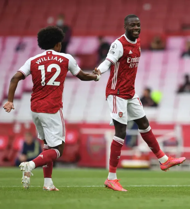 Framed Print : Pepe and Willian Celebrate Arsenal's Win Against West Bromwich Albion (2020-21)