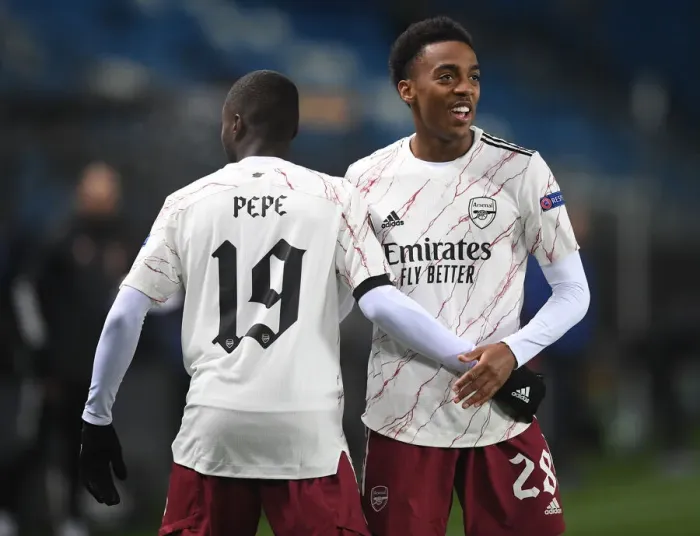 Framed Print : Pepe and Willock Celebrate Arsenal's First Goal Against Molde in Europa League