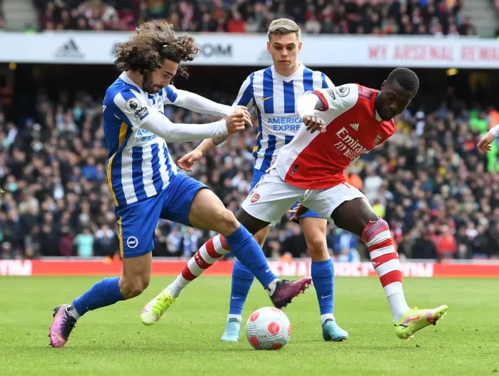 Framed Print : Pepe's Battle: Arsenal Star Goes Head-to-Head with Cucurella and Trossard in Intense Arsenal vs Brighton Clash (2021-22)
