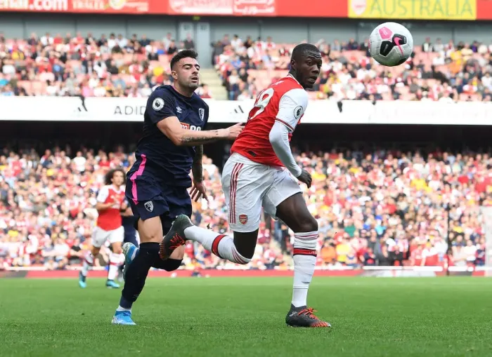 Framed Print : Pepe's Sneaky Moves: Arsenal Star Outwits Bournemouth's Rico in Exciting Premier League Showdown Framed Print : Pepe's Sneaky Moves: Arsenal Star Outwits Bournemouth's Rico in Exciting Premier League Showdown