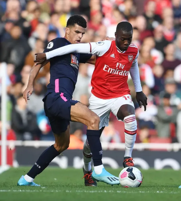 Framed Print : Pepe's Sneaky Moves: Outsmarting Solanke in Arsenal's Premier League Victory Framed Print : Pepe's Sneaky Moves: Outsmarting Solanke in Arsenal's Premier League Victory