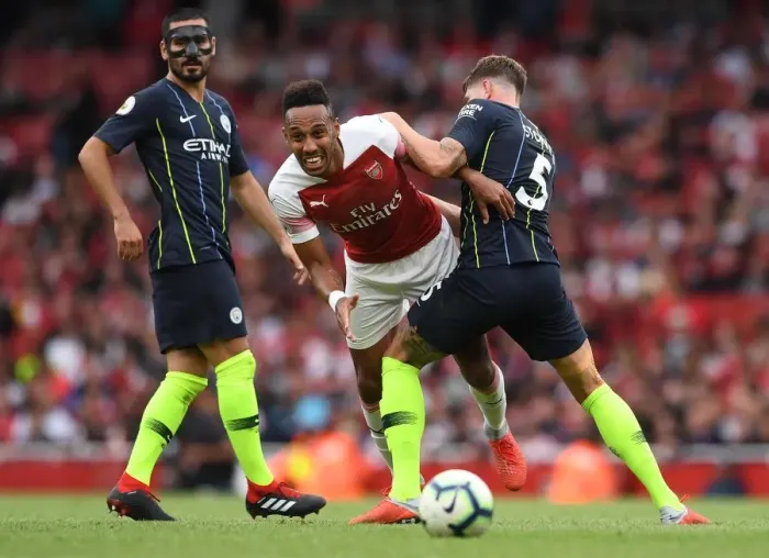 Framed Print : Pierre-Emerick Aubameyang (Arsenal) John Stones (Man City). Arsenal 0: 2 Manchester City Framed Print : Pierre-Emerick Aubameyang (Arsenal) John Stones (Man City). Arsenal 0: 2 Manchester City