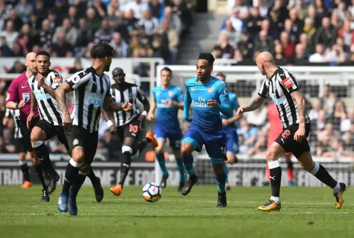 Framed Print : Pierre-Emerick Aubameyang Charges Forward Against Newcastle United in Premier League Clash