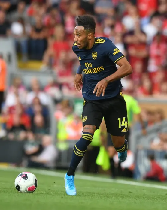 Framed Print : Pierre-Emerick Aubameyang Faces Off Against Liverpool in Premier League Clash