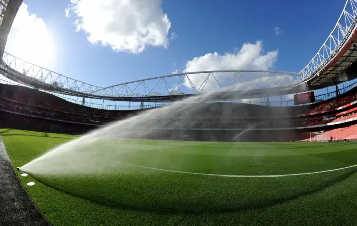 Framed Print : The pitch is watered before the match. Arsenal 3: 0 Burnley. Barclays Premier League Framed Print : The pitch is watered before the match. Arsenal 3: 0 Burnley. Barclays Premier League