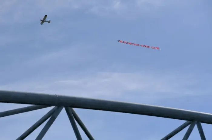 Framed Print : Plane Tows Arsene Wenger Tribute Banner Over Huddersfield Stadium Framed Print : Plane Tows Arsene Wenger Tribute Banner Over Huddersfield Stadium