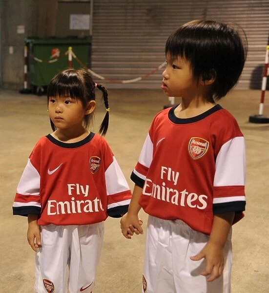 Player Escorts in the Tunnel: Kitchee FC vs. Arsenal FC (2012)