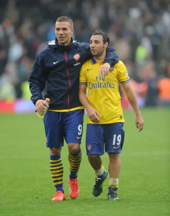 Framed Print : Podolski and Cazorla Celebrate Arsenal's Victory over Fulham (2013-14) Framed Print : Podolski and Cazorla Celebrate Arsenal's Victory over Fulham (2013-14)