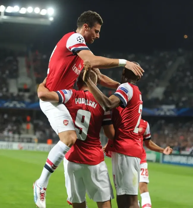 Framed Print : Podolski, Diaby, and Giroud: Arsenal's Goal Celebration in Montpellier (2012-13)