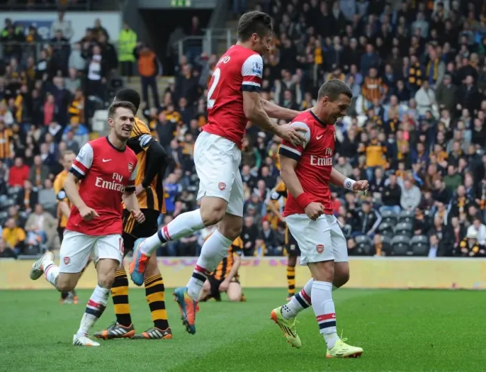 Framed Print : Podolski, Giroud, and Ramsey Celebrate Arsenal's Victory over Hull City Framed Print : Podolski, Giroud, and Ramsey Celebrate Arsenal's Victory over Hull City