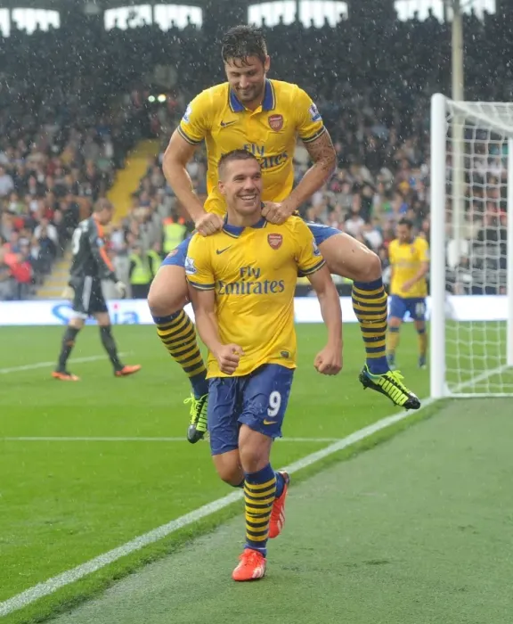 Framed Print : Podolski and Giroud's Euphoric Moment: Arsenal's Third Goal Against Fulham (2013-14) Framed Print : Podolski and Giroud's Euphoric Moment: Arsenal's Third Goal Against Fulham (2013-14)