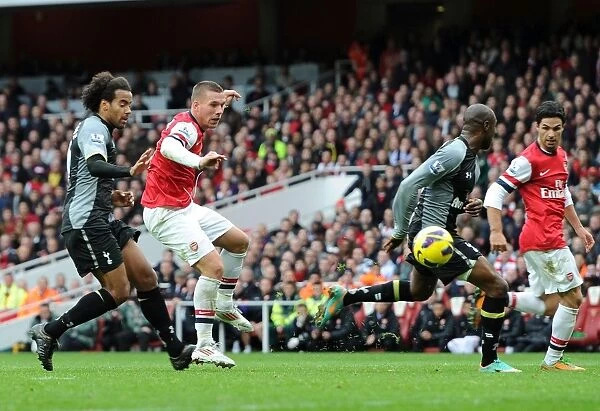 Podolski Scores Past Gallas: Arsenal's Thrilling Victory Over Tottenham in the Premier League 2012-13