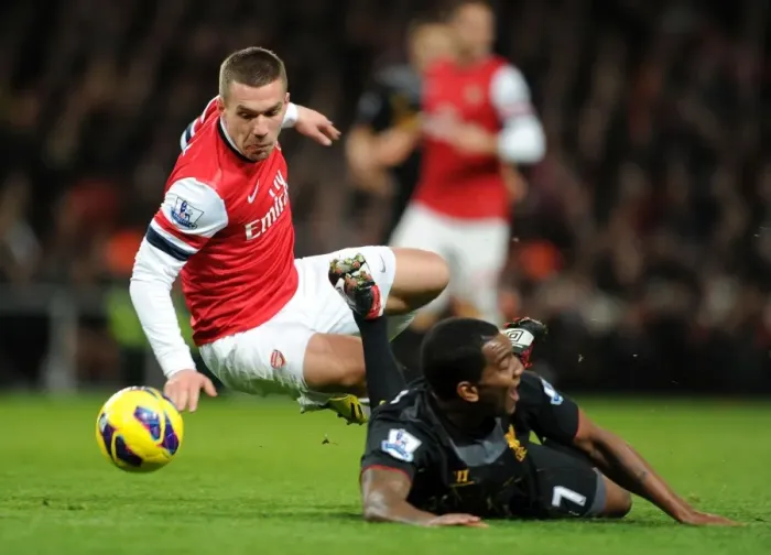 Framed Print : Podolski vs. Wisdom: A Premier League Showdown at Emirates Stadium - Arsenal vs. Liverpool (2013) Framed Print : Podolski vs. Wisdom: A Premier League Showdown at Emirates Stadium - Arsenal vs. Liverpool (2013)