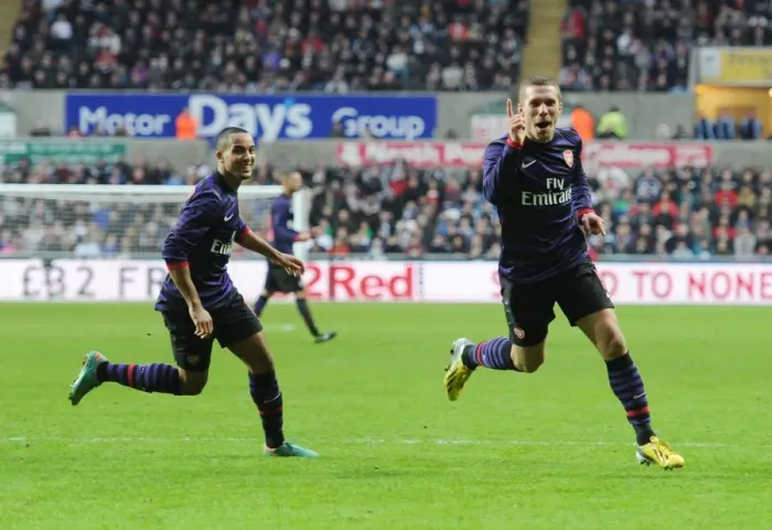Framed Print : Podolski and Walcott Celebrate Arsenal's FA Cup Goal Against Swansea