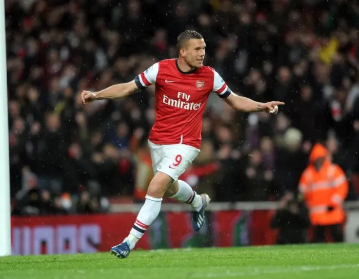 Framed Print : Podolski's Brace: Arsenal Crushes Wigan Athletic 4-1 in Premier League Framed Print : Podolski's Brace: Arsenal Crushes Wigan Athletic 4-1 in Premier League