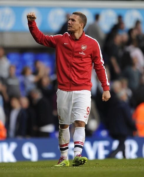 Podolski's Euphoria: Arsenal's Thrilling Victory over Tottenham in the Premier League, 2014