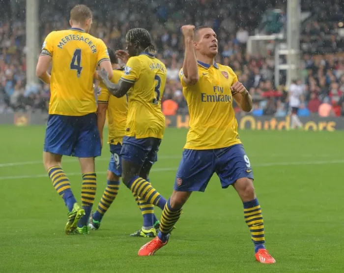 Framed Print : Podolski's Hat-Trick: Arsenal Triumphs Over Fulham in 2013-14 Premier League Framed Print : Podolski's Hat-Trick: Arsenal Triumphs Over Fulham in 2013-14 Premier League