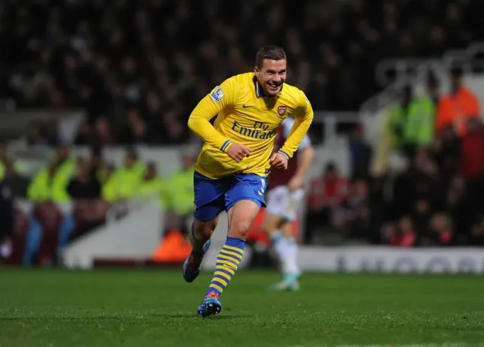 Framed Print : Podolski's Hat-Trick: Arsenal's Dominant Performance Against West Ham United (December 2013)