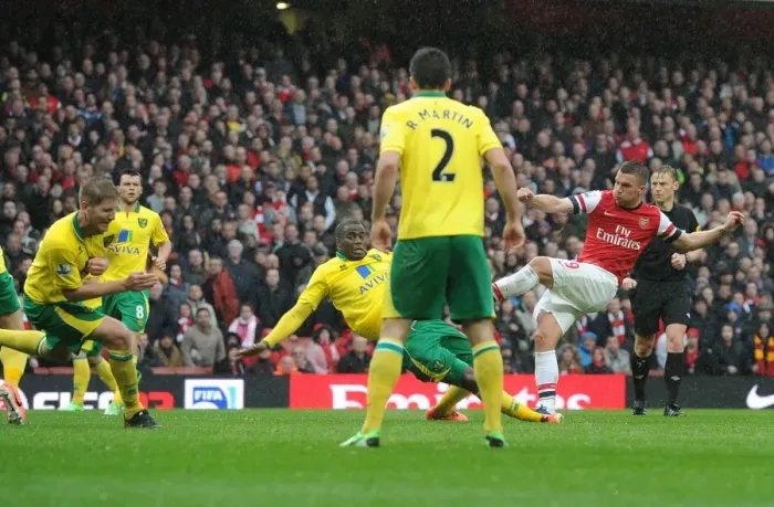 Framed Print : Podolski's Hat-Trick: Arsenal's Triumph Over Norwich City (April 2013)