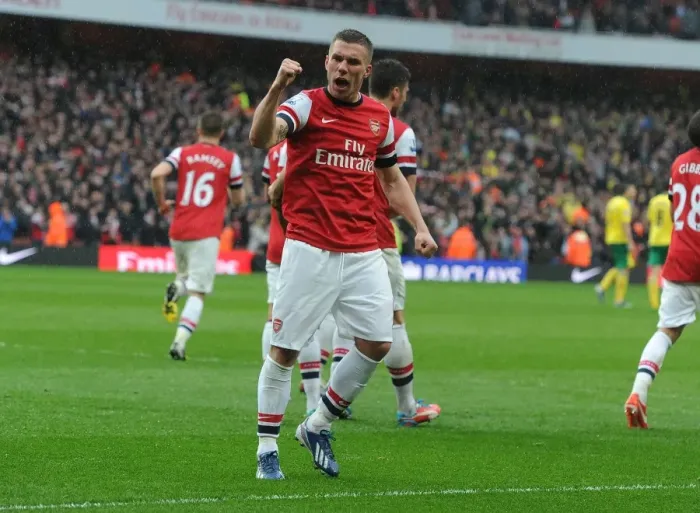 Framed Print : Podolski's Stunner: Arsenal's Triumph over Norwich City (2012-13)