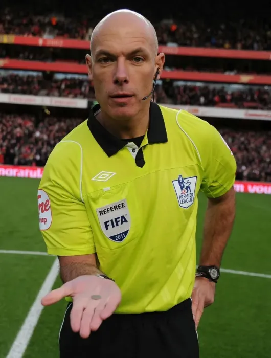 Framed Print : Premier League Showdown: Arsenal vs. Everton - Referee Howard Webb Conducts Coin Toss at Emirates Stadium (December 2011) Framed Print : Premier League Showdown: Arsenal vs. Everton - Referee Howard Webb Conducts Coin Toss at Emirates Stadium (December 2011)