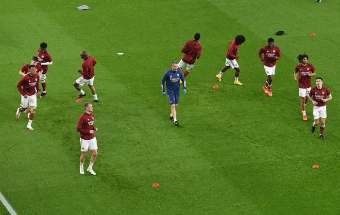 Framed Print : Premier League Showdown: Arsenal's Pre-Match Warm-Up vs Aston Villa