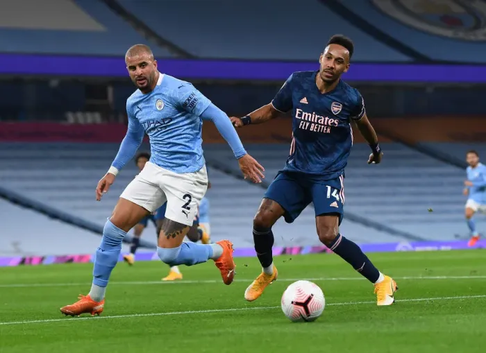 Framed Print : Premier League Showdown: Aubameyang vs. Walker - Manchester City vs. Arsenal (2020-21): A Battle of Stars at Etihad Stadium