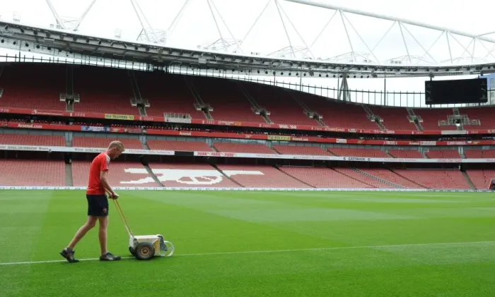 Framed Print : Preparing for the Arsenal vs Liverpool Battle: The Emirates Stadium Pitch Set for Premier League 2016-17 Clash