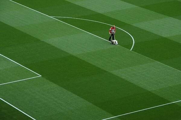 Preparing the Emirates Turf: Arsenal's Groundsmen Mark Out the Pitch for Arsenal vs. Sunderland (2015)