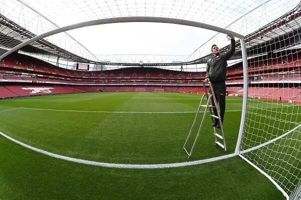 Preparing the Field: Arsenal Groundsman Readies Emirates Stadium for Arsenal v Watford