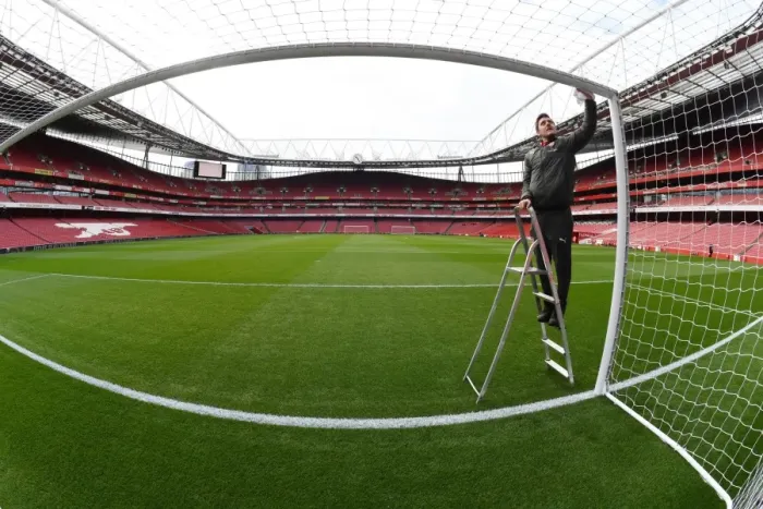 Framed Print : Preparing the Field: Arsenal Groundsman Readies Emirates Stadium for Arsenal v Watford Framed Print : Preparing the Field: Arsenal Groundsman Readies Emirates Stadium for Arsenal v Watford